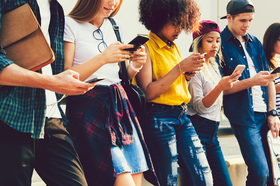 Diverse,Friends,Using,Their,Phones